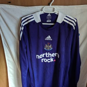 Newcastle United - player issue y firmada por la plantilla